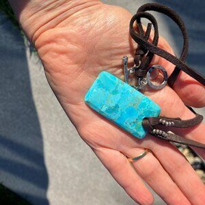 Turquoise amulet necklace on deerskin from Sundance/Peyote Bird Designs